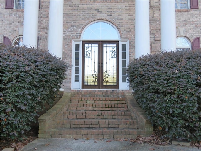 doorway to property featuring french doors