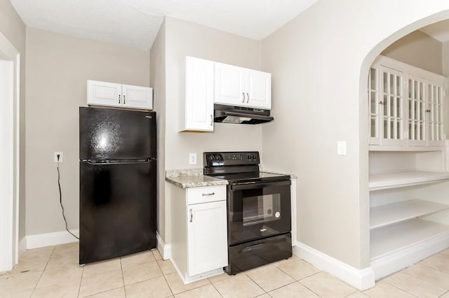 kitchen featuring black appliances, white cabinets, and under cabinet range hood