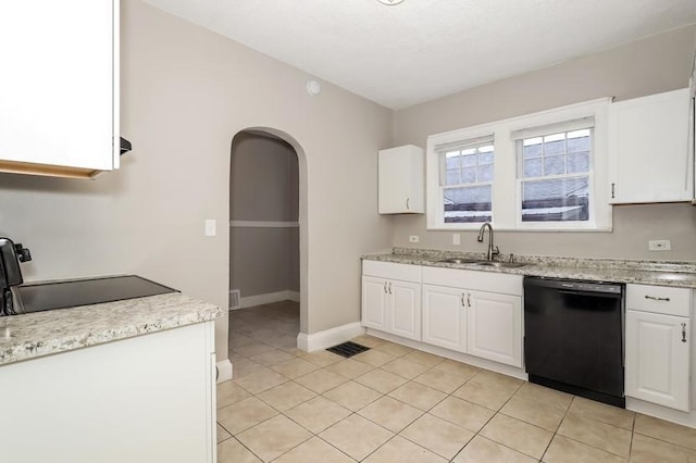 kitchen with arched walkways, stove, a sink, white cabinetry, and dishwasher