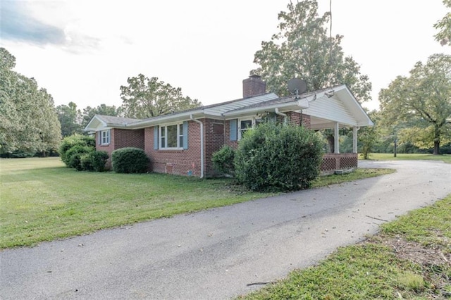 view of property exterior featuring a yard