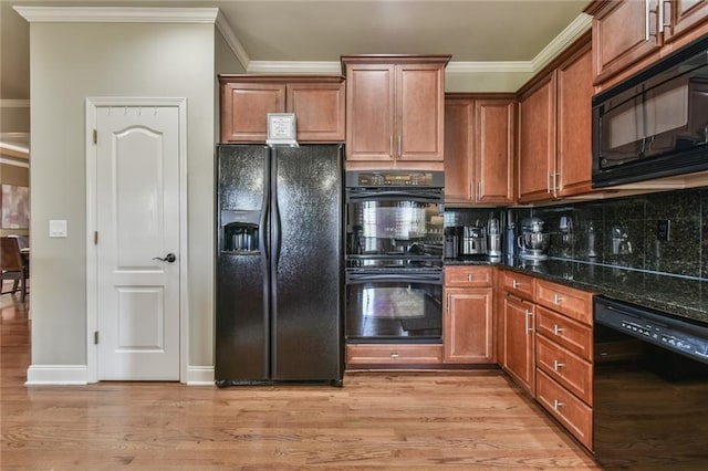 2727 Lost Mill Trce, Buford, GA 30519 - kitchen featuring black appliances, light wood-style floors, ornamental molding, and decorative backsplash