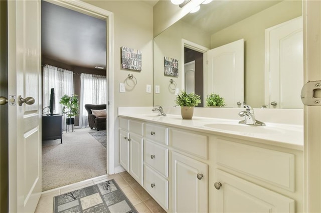 2727 Lost Mill Trce, Buford, GA 30519 - bathroom with tile patterned flooring, double vanity, and a sink