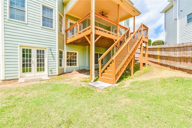 2727 Lost Mill Trce, Buford, GA 30519 - rear view of house featuring fence, a yard, and a wooden deck
