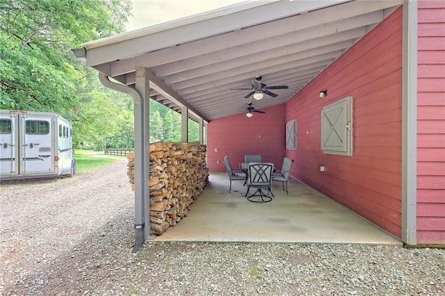 view of patio featuring ceiling fan