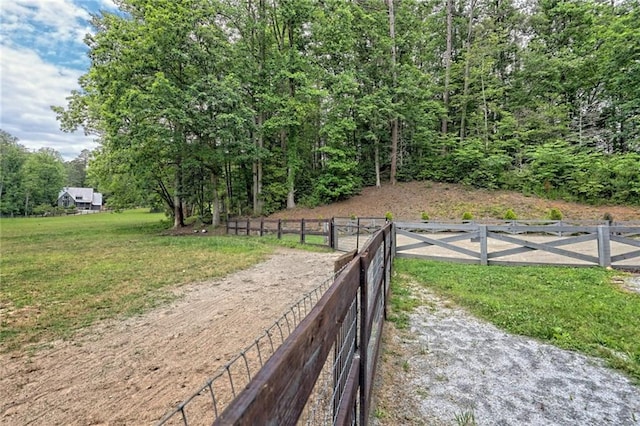 view of property's community featuring a yard