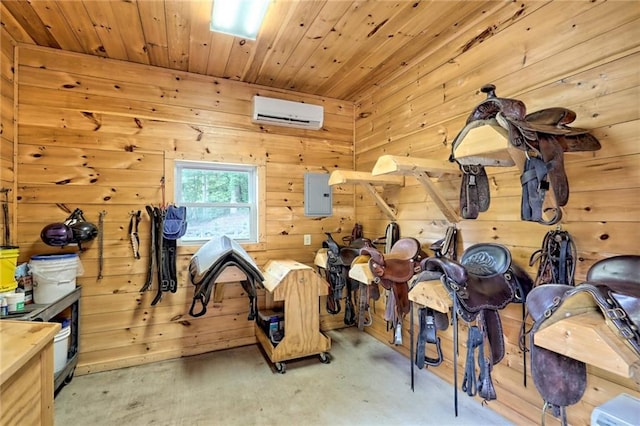 view of horse barn with a wall mounted air conditioner and electric panel