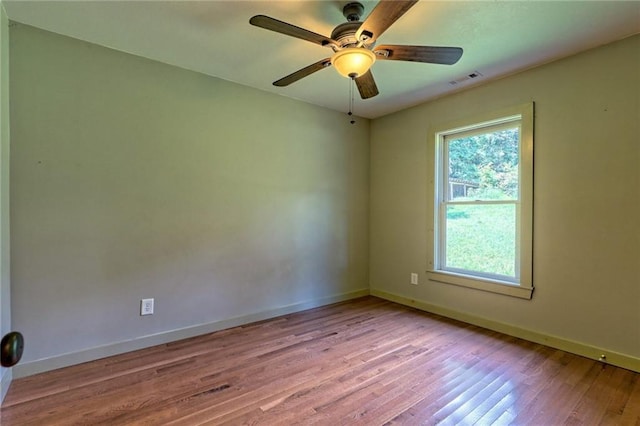 spare room with ceiling fan and light hardwood / wood-style floors