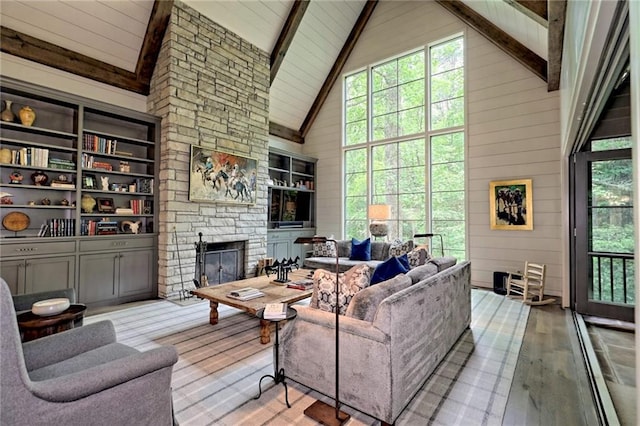 living room with beam ceiling, high vaulted ceiling, light hardwood / wood-style floors, wooden walls, and a fireplace