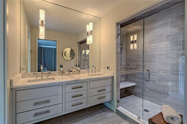 bathroom with vanity and walk in shower