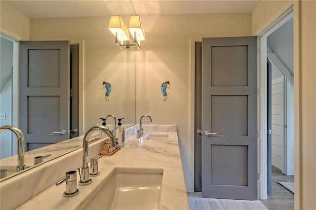 bathroom featuring vanity and wood-type flooring