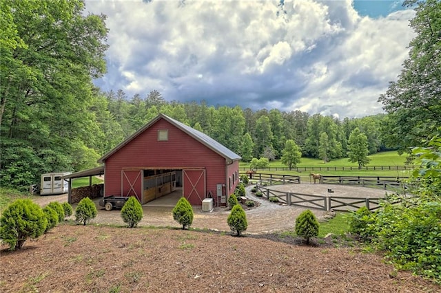 view of outdoor structure featuring a rural view