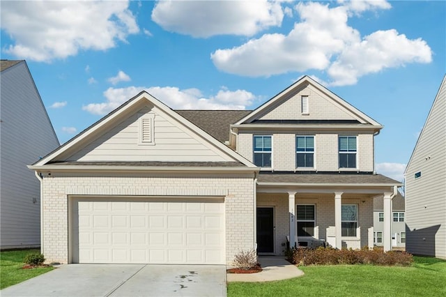 craftsman-style home featuring covered porch, a garage, and a front lawn