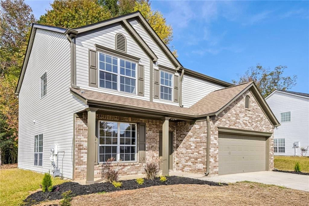 view of front of house with a garage