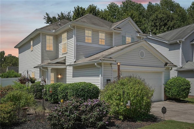 view of front of home with a garage