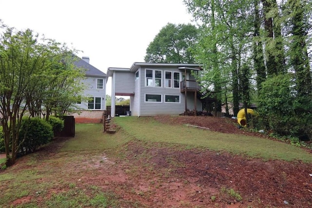 168 Harmony Grove Rd, Lilburn, GA 30047 - back of property with a yard