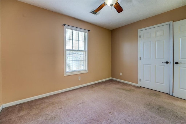 1240 H D Atha Rd, Monroe, GA 30655 - empty room with visible vents, baseboards, light colored carpet, and ceiling fan