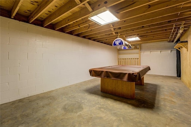 1240 H D Atha Rd, Monroe, GA 30655 - below grade area featuring concrete block wall and billiards