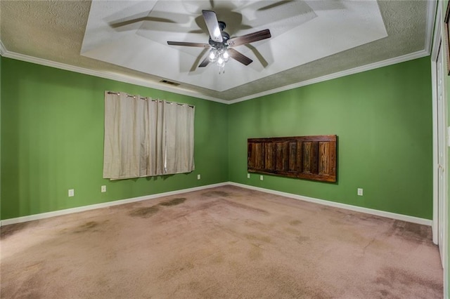 1240 H D Atha Rd, Monroe, GA 30655 - spare room with a ceiling fan, a textured ceiling, a raised ceiling, carpet flooring, and visible vents