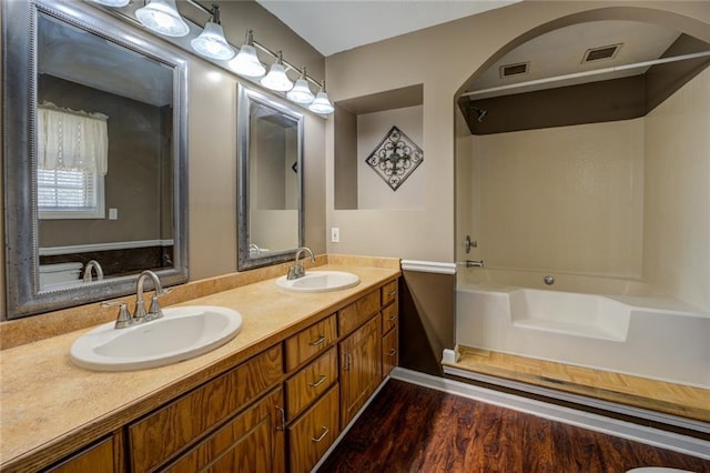 1240 H D Atha Rd, Monroe, GA 30655 - full bath featuring a sink, visible vents, and bathing tub / shower combination