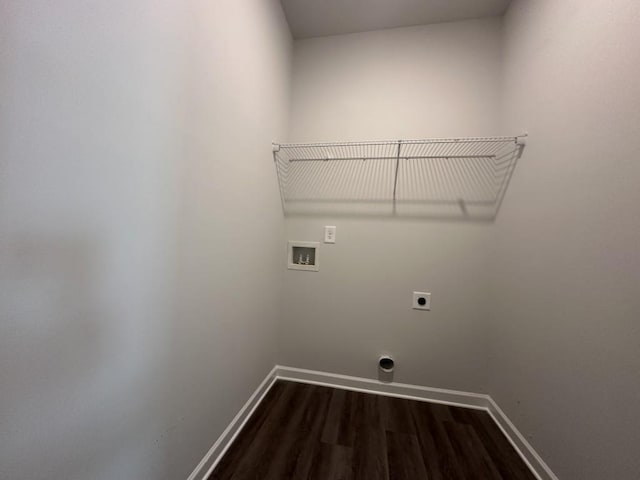 clothes washing area featuring hookup for a washing machine, dark wood-type flooring, hookup for an electric dryer, laundry area, and baseboards