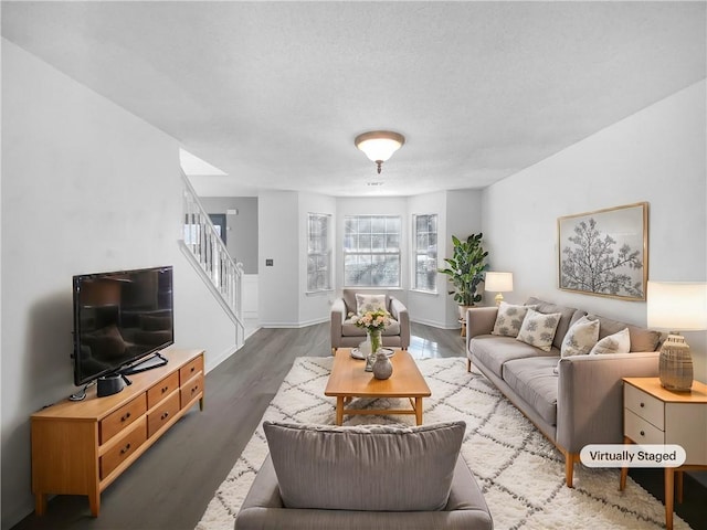 living room featuring dark hardwood / wood-style floors