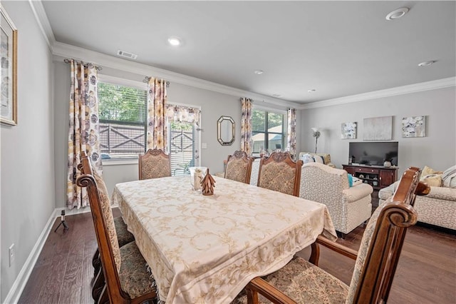 221 Irwell Path, Lawrenceville, GA 30044 - dining space with dark wood-style flooring, crown molding, baseboards, and recessed lighting