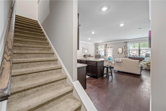 221 Irwell Path, Lawrenceville, GA 30044 - staircase with crown molding, wood finished floors, recessed lighting, and baseboards