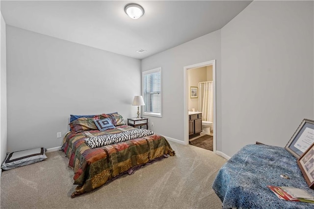 221 Irwell Path, Lawrenceville, GA 30044 - carpeted bedroom with baseboards and ensuite bath