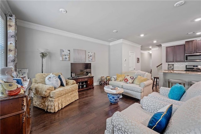221 Irwell Path, Lawrenceville, GA 30044 - living room featuring crown molding, dark wood-style flooring, recessed lighting, baseboards, and stairs