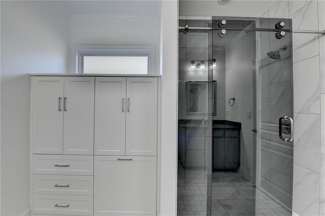 full bathroom featuring ornamental molding and a stall shower