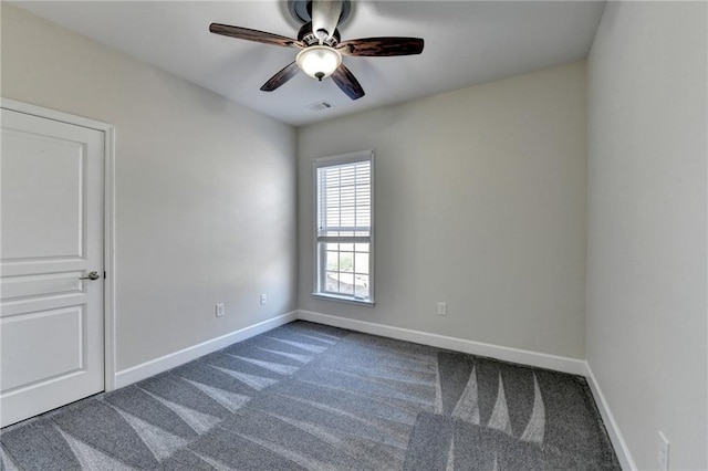 unfurnished room with a ceiling fan, carpet, visible vents, and baseboards