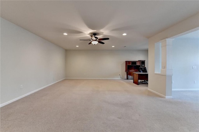 unfurnished living room with a ceiling fan, recessed lighting, light carpet, and baseboards