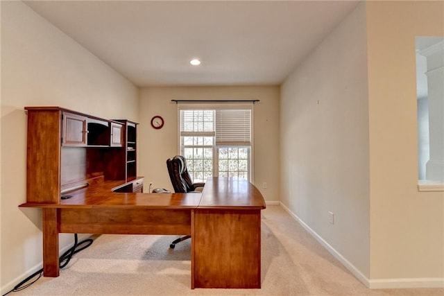 office space featuring recessed lighting, light carpet, and baseboards