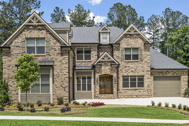 407 Estates View Dr, Acworth, GA 30101 - view of front of home featuring concrete driveway, a front yard, an attached garage, and roof with shingles