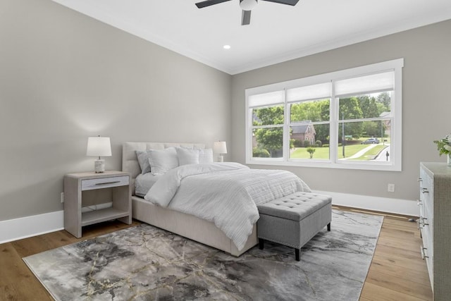 407 Estates View Dr, Acworth, GA 30101 - bedroom with crown molding, baseboards, wood finished floors, and ceiling fan