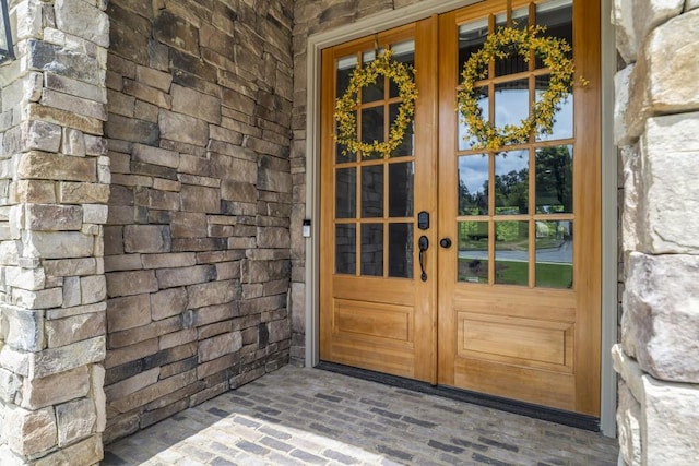 407 Estates View Dr, Acworth, GA 30101 - property entrance featuring french doors and stone siding