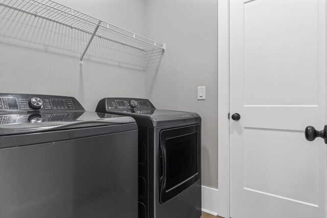 407 Estates View Dr, Acworth, GA 30101 - washroom with washing machine and clothes dryer and baseboards