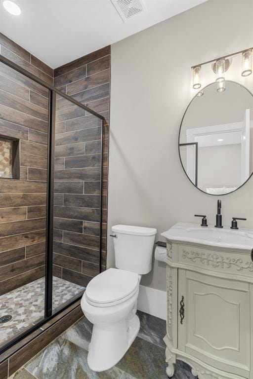 407 Estates View Dr, Acworth, GA 30101 - full bathroom with a stall shower, toilet, vanity, and baseboards