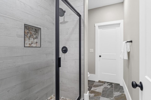 407 Estates View Dr, Acworth, GA 30101 - full bath featuring a stall shower, baseboards, and toilet