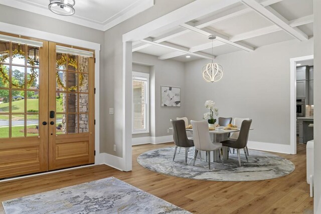 407 Estates View Dr, Acworth, GA 30101 - dining area featuring coffered ceiling, baseboards, a chandelier, wood finished floors, and french doors