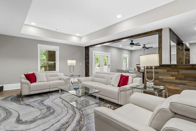 407 Estates View Dr, Acworth, GA 30101 - living area featuring baseboards, wood finished floors, ceiling fan, recessed lighting, and a raised ceiling