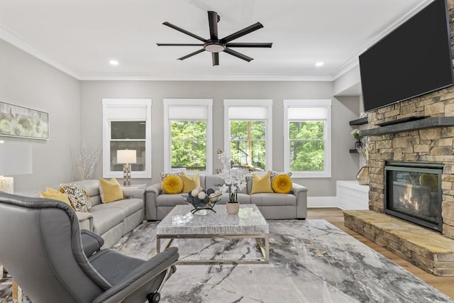 407 Estates View Dr, Acworth, GA 30101 - living room featuring wood finished floors, a fireplace, a ceiling fan, crown molding, and recessed lighting