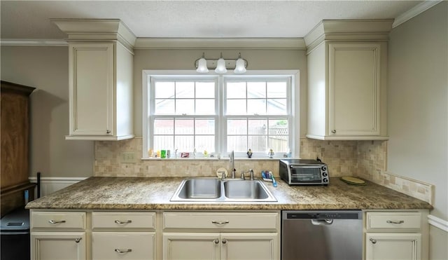 kitchen featuring a toaster, stainless steel dishwasher, a sink, crown molding, and decorative backsplash