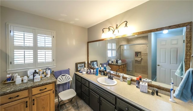 full bathroom featuring vanity and a stall shower
