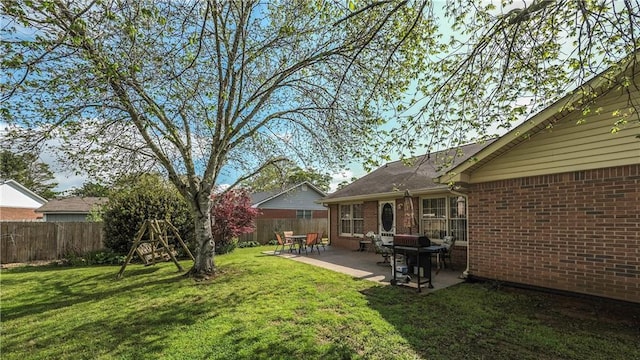 view of yard featuring a fenced backyard and a patio