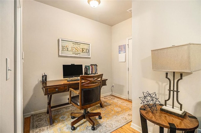 2294 Spicy Pine Ln, Lawrenceville, GA 30044 - office area with wood finished floors and baseboards