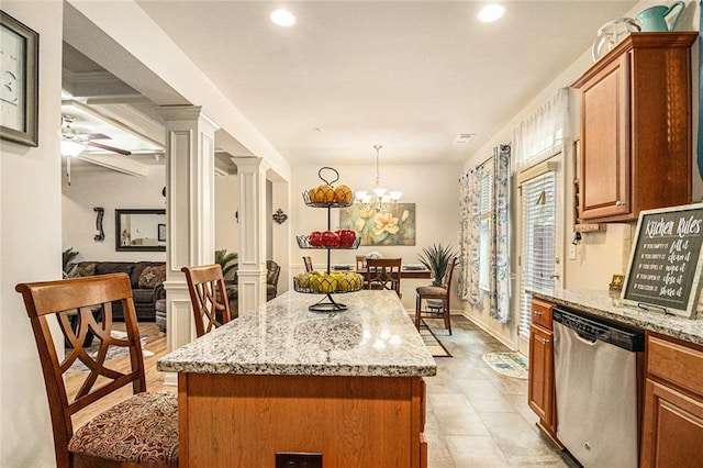2294 Spicy Pine Ln, Lawrenceville, GA 30044 - kitchen with dishwasher, a center island, a ceiling fan, light stone countertops, and recessed lighting