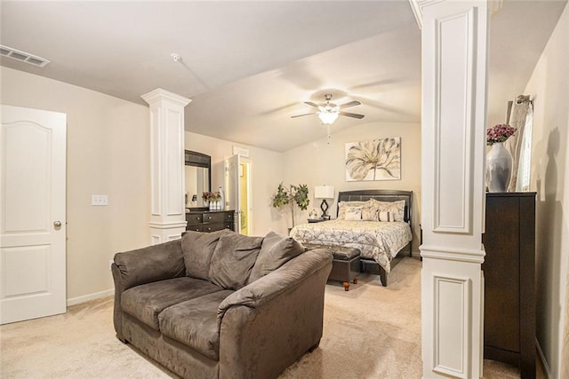 2294 Spicy Pine Ln, Lawrenceville, GA 30044 - bedroom with ornate columns, light colored carpet, vaulted ceiling, a ceiling fan, and baseboards
