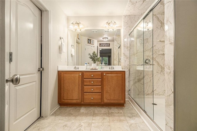 2294 Spicy Pine Ln, Lawrenceville, GA 30044 - full bathroom featuring double vanity, a marble finish shower, and baseboards