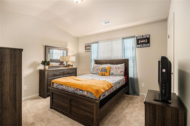 2294 Spicy Pine Ln, Lawrenceville, GA 30044 - bedroom featuring vaulted ceiling, light carpet, and baseboards